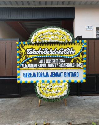 Papan Bunga Duka di Woda